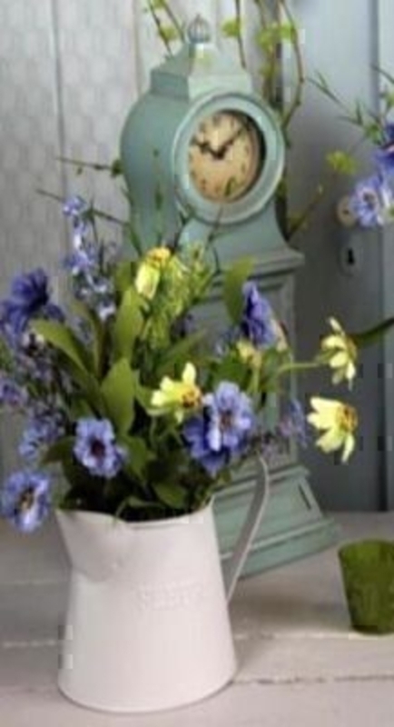 Jug of Yellow and Blue Artificial Meadow Flowers by Bloomsberry. These stunning silk flowers give the impression they have just been hand picked from a meadow especially for you. For realistic fake and silk flowers Bloomsberry is second to none.